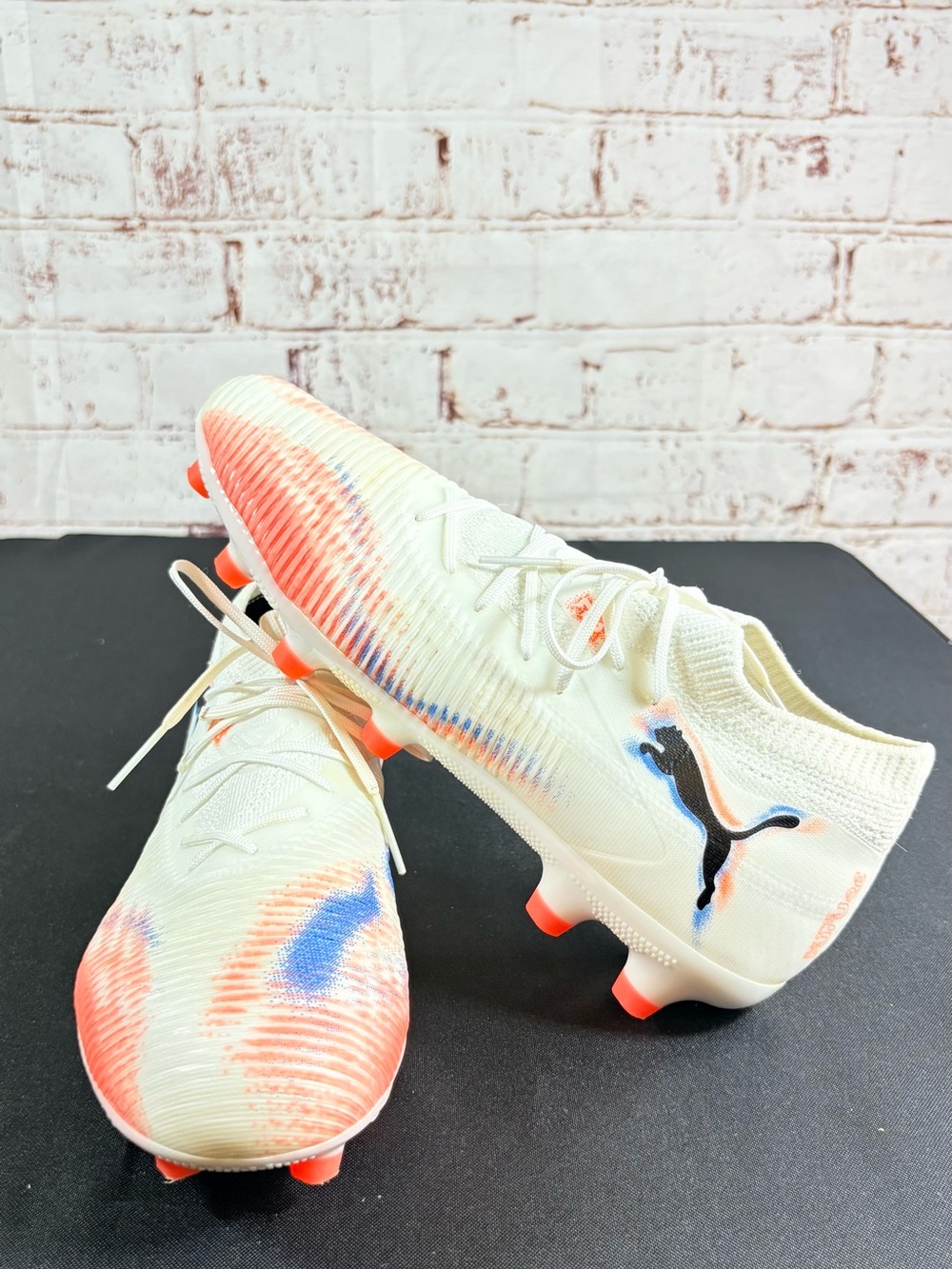 Puma Kids White Football Cleats with Coral and Blue Accents